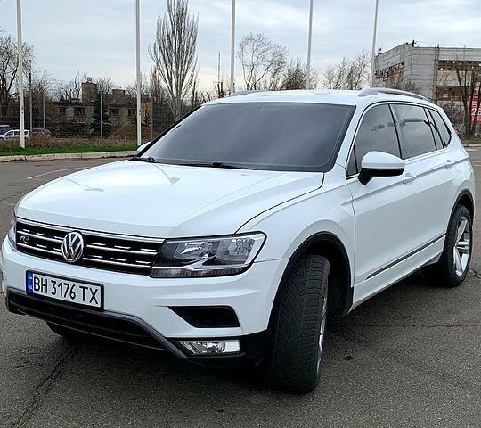 Білий Фольксваген Тігуан, об'ємом двигуна 2 л та пробігом 132 тис. км за 20000 $, фото 1 на Automoto.ua