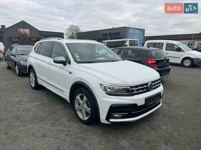 Белый Фольксваген Тигуан, объемом двигателя 1.98 л и пробегом 234 тыс. км за 32500 $, фото 1 на Automoto.ua