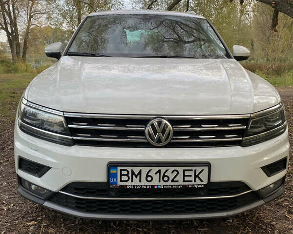 Белый Фольксваген Тигуан, объемом двигателя 1.97 л и пробегом 254 тыс. км за 24900 $, фото 1 на Automoto.ua