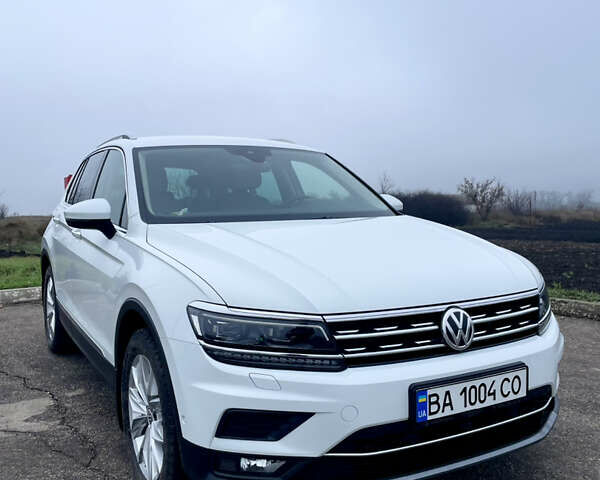 Білий Фольксваген Тігуан, об'ємом двигуна 1.97 л та пробігом 75 тис. км за 28000 $, фото 1 на Automoto.ua