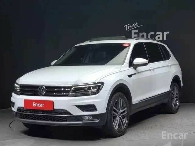 Білий Фольксваген Тігуан, об'ємом двигуна 2 л та пробігом 41 тис. км за 18000 $, фото 1 на Automoto.ua