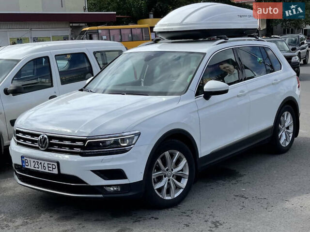 Білий Фольксваген Тігуан, об'ємом двигуна 1.97 л та пробігом 100 тис. км за 28500 $, фото 1 на Automoto.ua