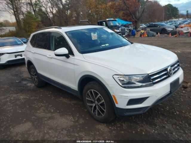 Белый Фольксваген Тигуан, объемом двигателя 2 л и пробегом 31 тыс. км за 5000 $, фото 1 на Automoto.ua