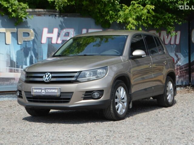 Бежевий Фольксваген Тігуан, об'ємом двигуна 1.4 л та пробігом 211 тис. км за 11500 $, фото 1 на Automoto.ua
