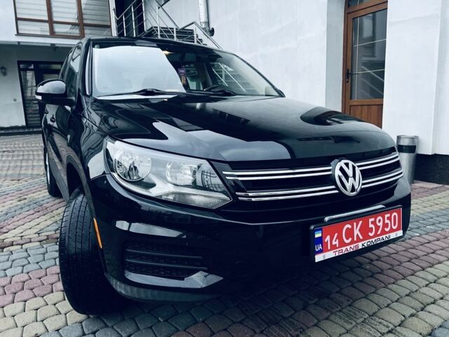 Черный Фольксваген Тигуан, объемом двигателя 2 л и пробегом 185 тыс. км за 9999 $, фото 1 на Automoto.ua