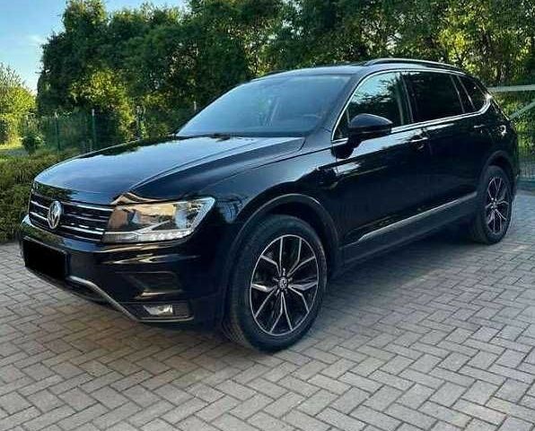 Черный Фольксваген Тигуан, объемом двигателя 2 л и пробегом 98 тыс. км за 15000 $, фото 1 на Automoto.ua
