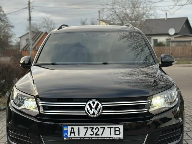 Черный Фольксваген Тигуан, объемом двигателя 2 л и пробегом 107 тыс. км за 13600 $, фото 1 на Automoto.ua