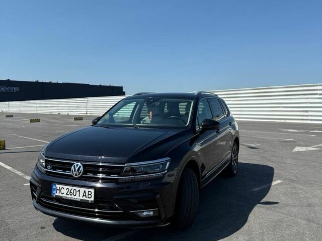 Черный Фольксваген Тигуан, объемом двигателя 2 л и пробегом 160 тыс. км за 24200 $, фото 1 на Automoto.ua