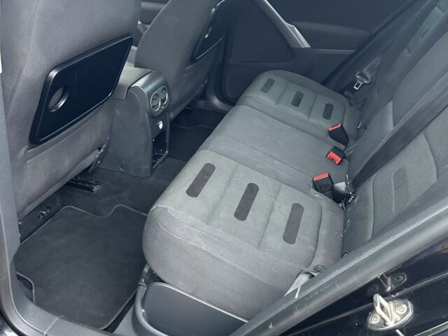 Черный Фольксваген Тигуан, объемом двигателя 1.4 л и пробегом 283 тыс. км за 5589 $, фото 1 на Automoto.ua