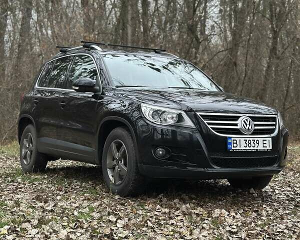 Черный Фольксваген Тигуан, объемом двигателя 1.97 л и пробегом 214 тыс. км за 13500 $, фото 1 на Automoto.ua