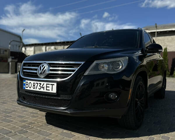 Чорний Фольксваген Тігуан, об'ємом двигуна 2 л та пробігом 270 тис. км за 11500 $, фото 1 на Automoto.ua