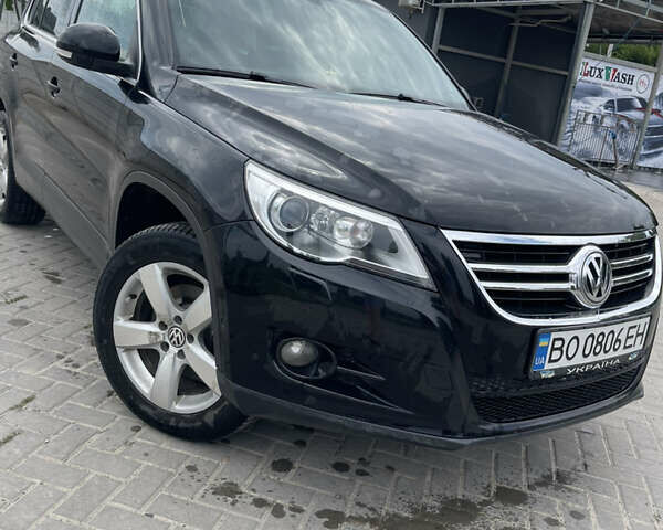 Черный Фольксваген Тигуан, объемом двигателя 1.97 л и пробегом 209 тыс. км за 12500 $, фото 1 на Automoto.ua