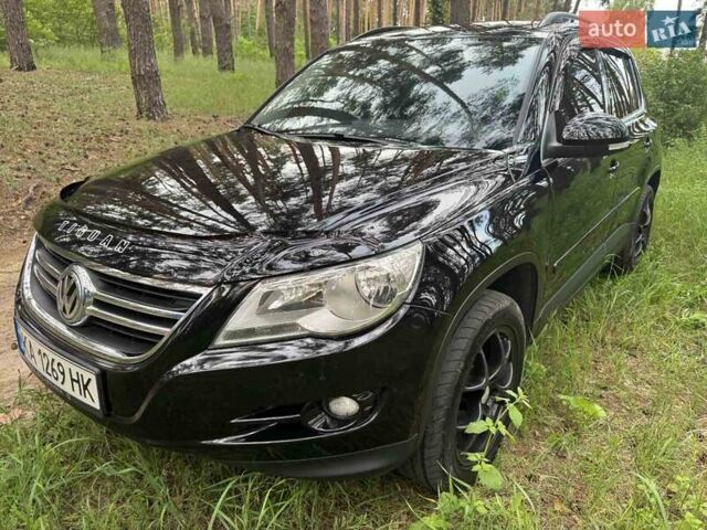 Черный Фольксваген Тигуан, объемом двигателя 1.97 л и пробегом 210 тыс. км за 11500 $, фото 1 на Automoto.ua