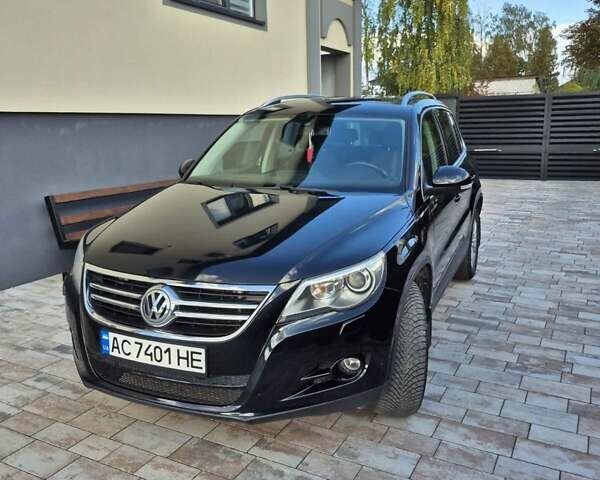 Чорний Фольксваген Тігуан, об'ємом двигуна 2 л та пробігом 218 тис. км за 9300 $, фото 1 на Automoto.ua