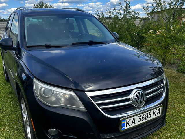 Чорний Фольксваген Тігуан, об'ємом двигуна 2 л та пробігом 309 тис. км за 8700 $, фото 1 на Automoto.ua