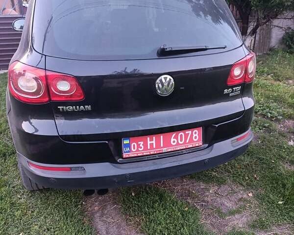 Черный Фольксваген Тигуан, объемом двигателя 2 л и пробегом 240 тыс. км за 13500 $, фото 1 на Automoto.ua
