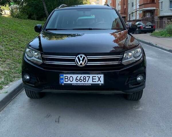 Чорний Фольксваген Тігуан, об'ємом двигуна 2 л та пробігом 226 тис. км за 11600 $, фото 1 на Automoto.ua