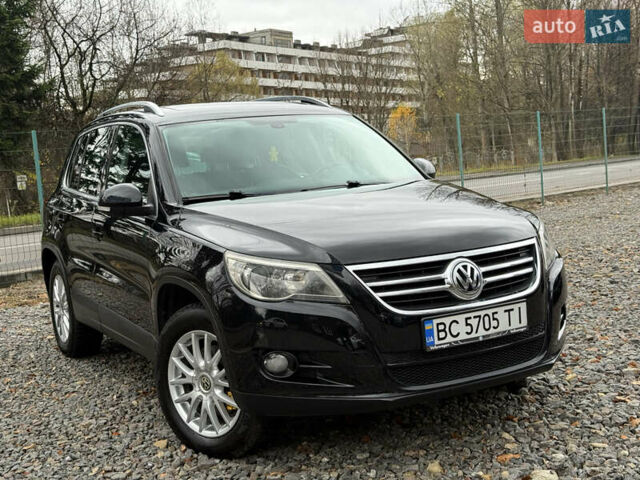 Чорний Фольксваген Тігуан, об'ємом двигуна 2 л та пробігом 238 тис. км за 10599 $, фото 1 на Automoto.ua