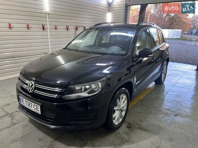 Черный Фольксваген Тигуан, объемом двигателя 1.97 л и пробегом 240 тыс. км за 12200 $, фото 1 на Automoto.ua