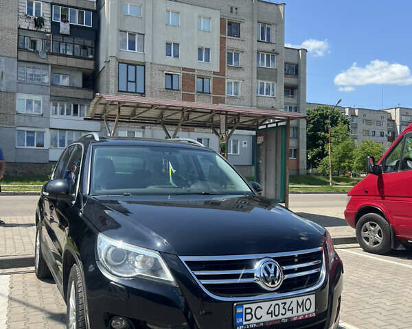 Чорний Фольксваген Тігуан, об'ємом двигуна 1.97 л та пробігом 386 тис. км за 10500 $, фото 1 на Automoto.ua