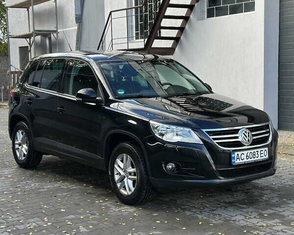 Черный Фольксваген Тигуан, объемом двигателя 1.98 л и пробегом 210 тыс. км за 12000 $, фото 1 на Automoto.ua