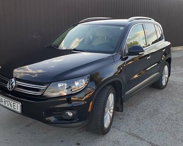 Чорний Фольксваген Тігуан, об'ємом двигуна 1.98 л та пробігом 231 тис. км за 10500 $, фото 1 на Automoto.ua