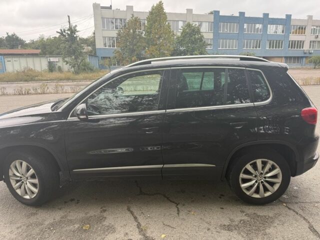 Черный Фольксваген Тигуан, объемом двигателя 2 л и пробегом 181 тыс. км за 13999 $, фото 1 на Automoto.ua