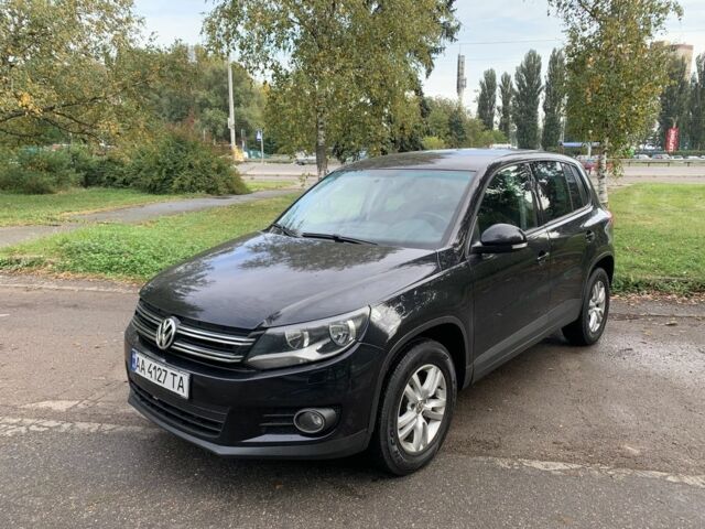 Черный Фольксваген Тигуан, объемом двигателя 2 л и пробегом 130 тыс. км за 10200 $, фото 1 на Automoto.ua