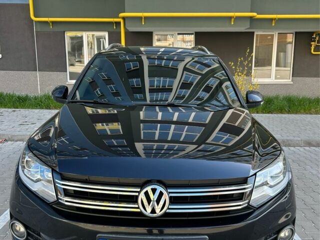 Чорний Фольксваген Тігуан, об'ємом двигуна 0 л та пробігом 195 тис. км за 16000 $, фото 1 на Automoto.ua