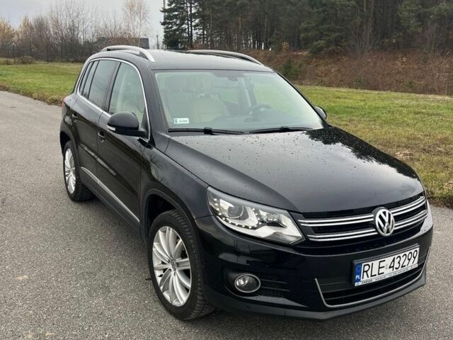 Чорний Фольксваген Тігуан, об'ємом двигуна 2 л та пробігом 160 тис. км за 7800 $, фото 1 на Automoto.ua