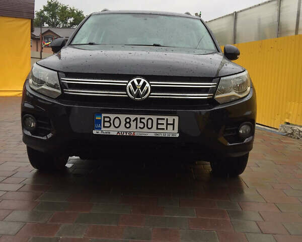 Черный Фольксваген Тигуан, объемом двигателя 2 л и пробегом 130 тыс. км за 13300 $, фото 1 на Automoto.ua