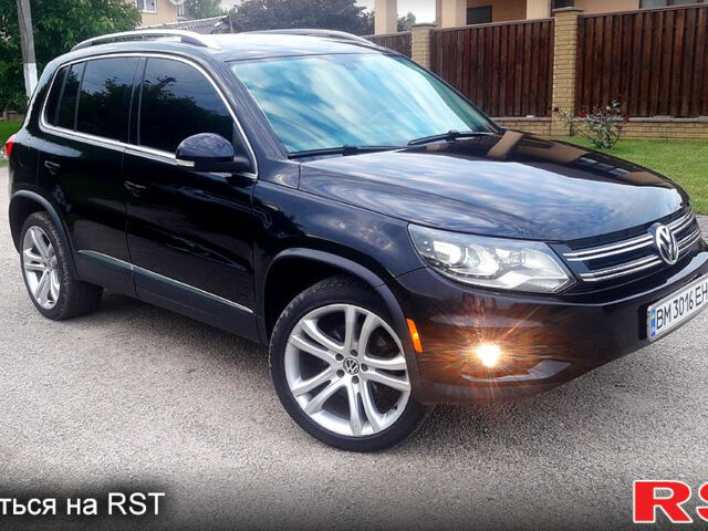 Чорний Фольксваген Тігуан, об'ємом двигуна 2 л та пробігом 183 тис. км за 12500 $, фото 1 на Automoto.ua