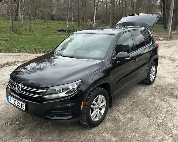 Черный Фольксваген Тигуан, объемом двигателя 1.98 л и пробегом 210 тыс. км за 10500 $, фото 1 на Automoto.ua