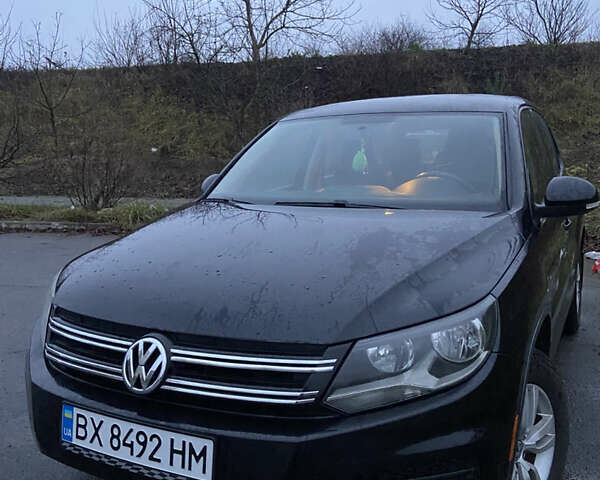 Черный Фольксваген Тигуан, объемом двигателя 1.98 л и пробегом 320 тыс. км за 11500 $, фото 1 на Automoto.ua