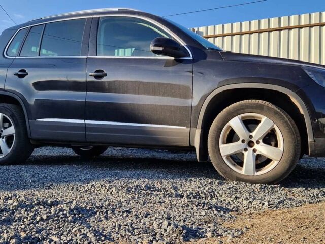 Черный Фольксваген Тигуан, объемом двигателя 2 л и пробегом 140 тыс. км за 15999 $, фото 1 на Automoto.ua