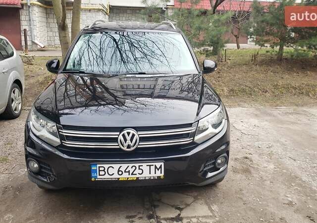 Черный Фольксваген Тигуан, объемом двигателя 2 л и пробегом 267 тыс. км за 13000 $, фото 1 на Automoto.ua