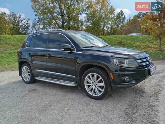 Черный Фольксваген Тигуан, объемом двигателя 2 л и пробегом 156 тыс. км за 11900 $, фото 1 на Automoto.ua