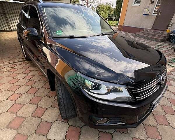 Чорний Фольксваген Тігуан, об'ємом двигуна 2 л та пробігом 234 тис. км за 14000 $, фото 1 на Automoto.ua