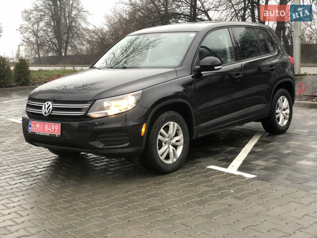 Черный Фольксваген Тигуан, объемом двигателя 1.98 л и пробегом 149 тыс. км за 11500 $, фото 1 на Automoto.ua