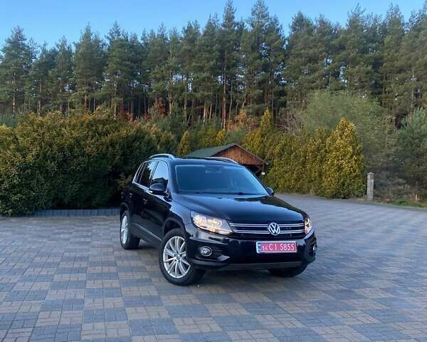 Чорний Фольксваген Тігуан, об'ємом двигуна 1.99 л та пробігом 180 тис. км за 11300 $, фото 1 на Automoto.ua