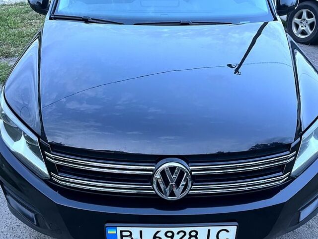 Чорний Фольксваген Тігуан, об'ємом двигуна 2 л та пробігом 261 тис. км за 13000 $, фото 1 на Automoto.ua