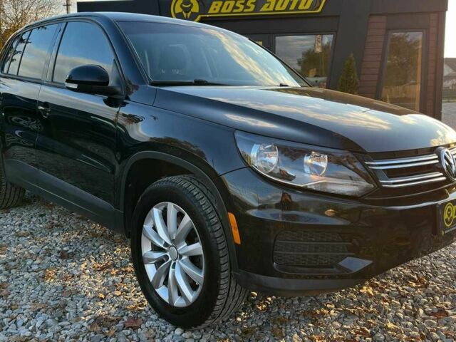 Чорний Фольксваген Тігуан, об'ємом двигуна 2 л та пробігом 200 тис. км за 10999 $, фото 1 на Automoto.ua