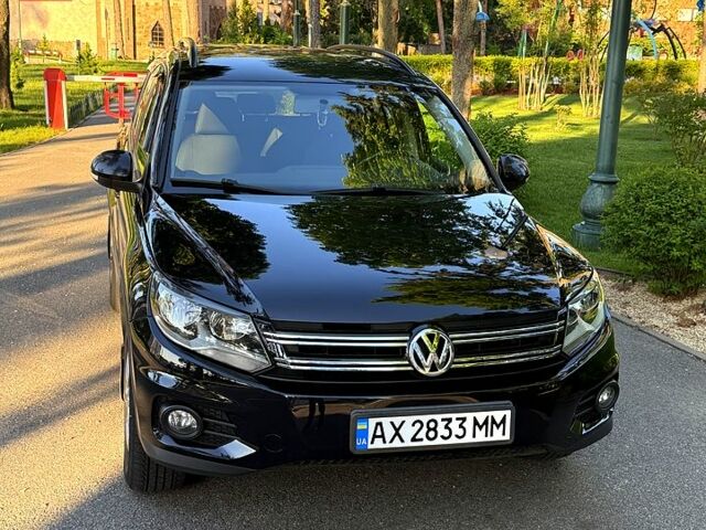 Чорний Фольксваген Тігуан, об'ємом двигуна 2 л та пробігом 190 тис. км за 13000 $, фото 1 на Automoto.ua