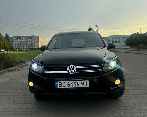 Чорний Фольксваген Тігуан, об'ємом двигуна 2 л та пробігом 260 тис. км за 13000 $, фото 1 на Automoto.ua