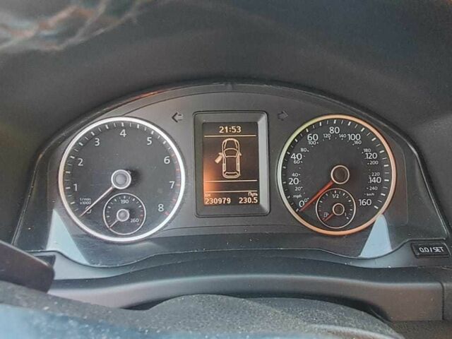 Чорний Фольксваген Тігуан, об'ємом двигуна 2 л та пробігом 231 тис. км за 12000 $, фото 1 на Automoto.ua