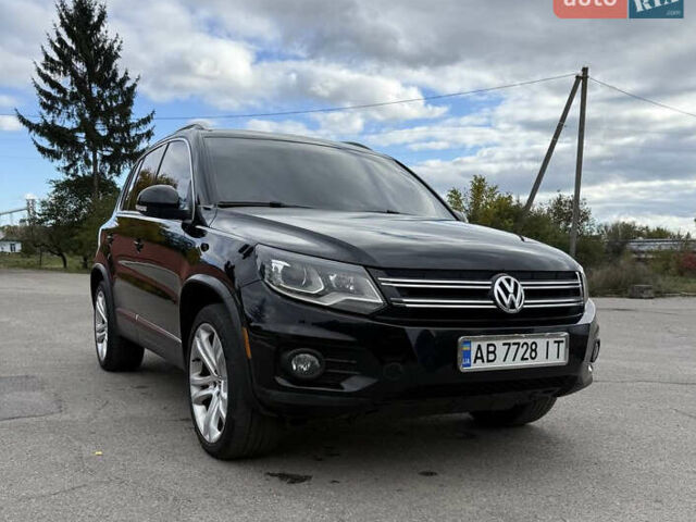 Чорний Фольксваген Тігуан, об'ємом двигуна 2 л та пробігом 200 тис. км за 12900 $, фото 1 на Automoto.ua