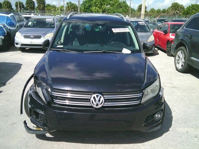 Чорний Фольксваген Тігуан, об'ємом двигуна 2 л та пробігом 156 тис. км за 7000 $, фото 1 на Automoto.ua