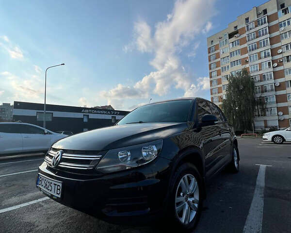 Черный Фольксваген Тигуан, объемом двигателя 1.98 л и пробегом 250 тыс. км за 10000 $, фото 1 на Automoto.ua