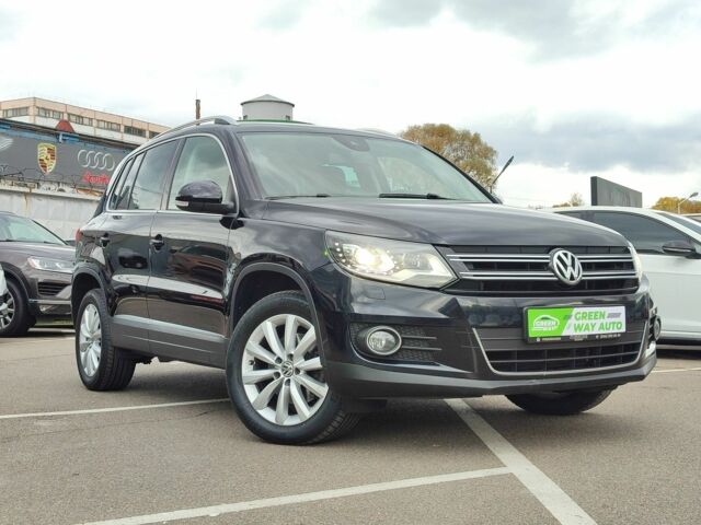 Чорний Фольксваген Тігуан, об'ємом двигуна 2 л та пробігом 150 тис. км за 18799 $, фото 1 на Automoto.ua