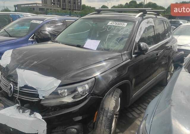 Чорний Фольксваген Тігуан, об'ємом двигуна 2 л та пробігом 210 тис. км за 7800 $, фото 1 на Automoto.ua
